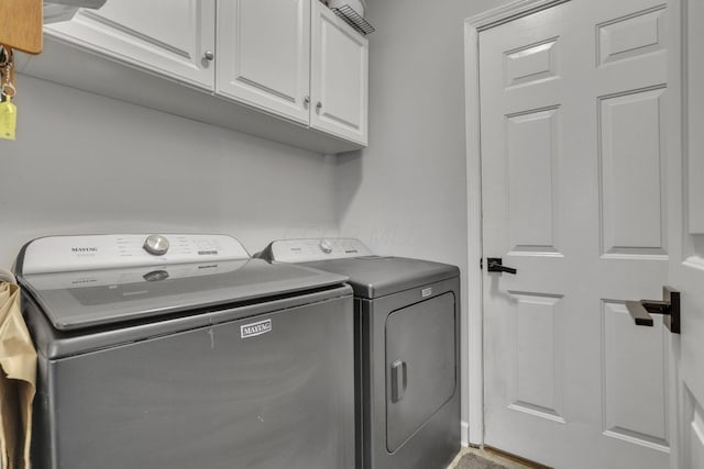 173 Zackary Dr, Granville, OH 43023 - washroom with separate washer and dryer and cabinet space