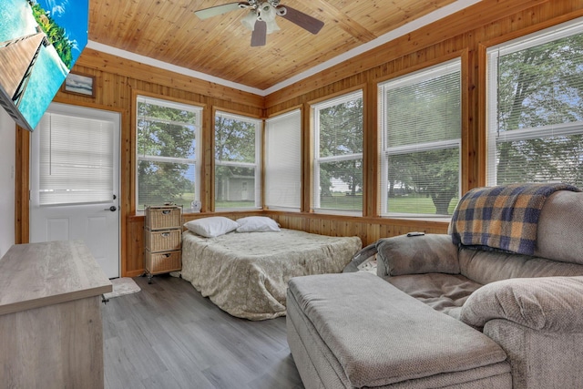 173 Zackary Dr, Granville, OH 43023 - bedroom featuring multiple windows, wooden walls, wood finished floors, and wood ceiling