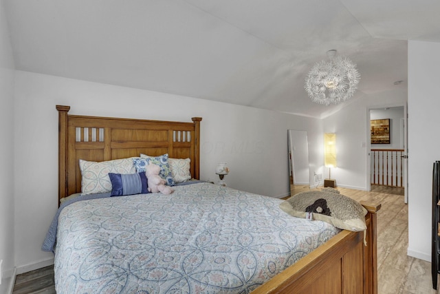 173 Zackary Dr, Granville, OH 43023 - bedroom featuring vaulted ceiling and baseboards