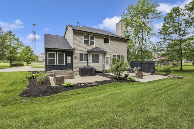 173 Zackary Dr, Granville, OH 43023 - rear view of property featuring a patio area, a fire pit, a chimney, and a shingled roof