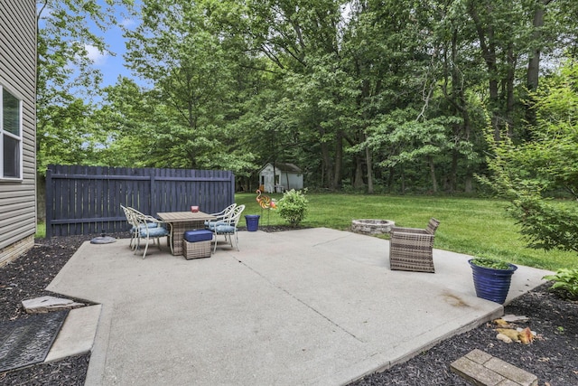 173 Zackary Dr, Granville, OH 43023 - view of patio / terrace featuring an outdoor fire pit, a shed, and outdoor dining area