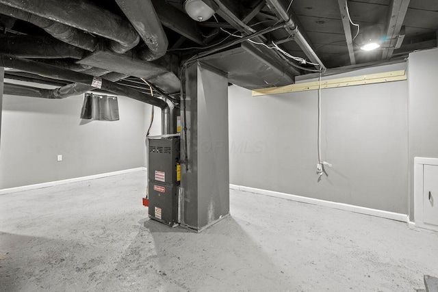 66 N Burgess Ave, Columbus, OH 43204 - unfinished below grade area featuring baseboards and heating unit