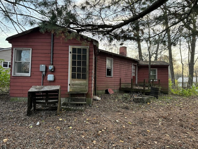 13428 King Rd NE, Thornville, OH 43076 - rear view of property featuring a chimney and entry steps