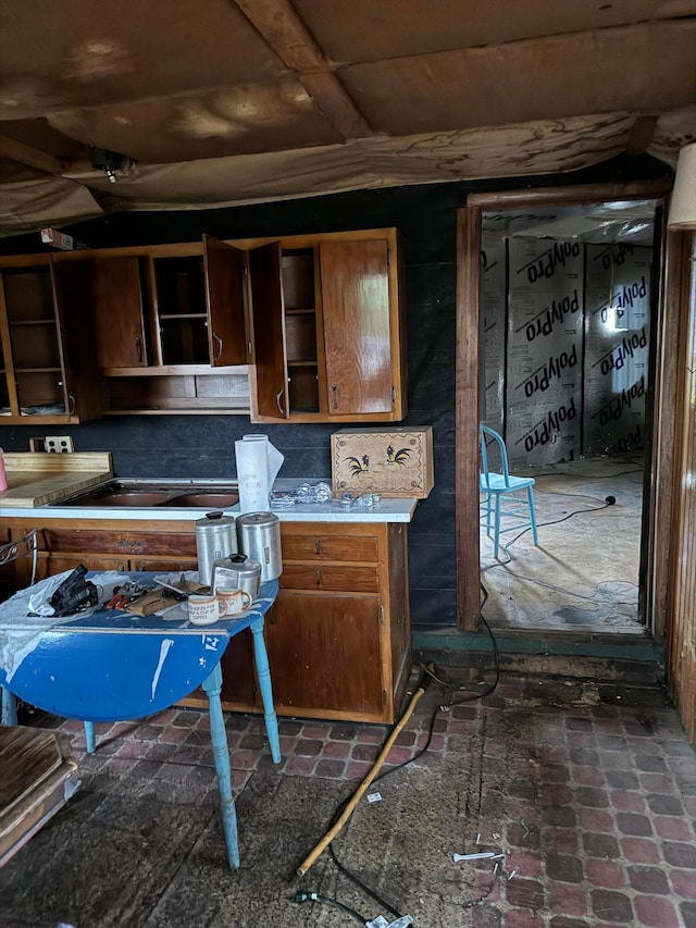 13428 King Rd NE, Thornville, OH 43076 - kitchen featuring open shelves, light countertops, and brown cabinets