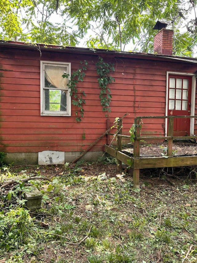 13428 King Rd NE, Thornville, OH 43076 - view of property exterior with a chimney
