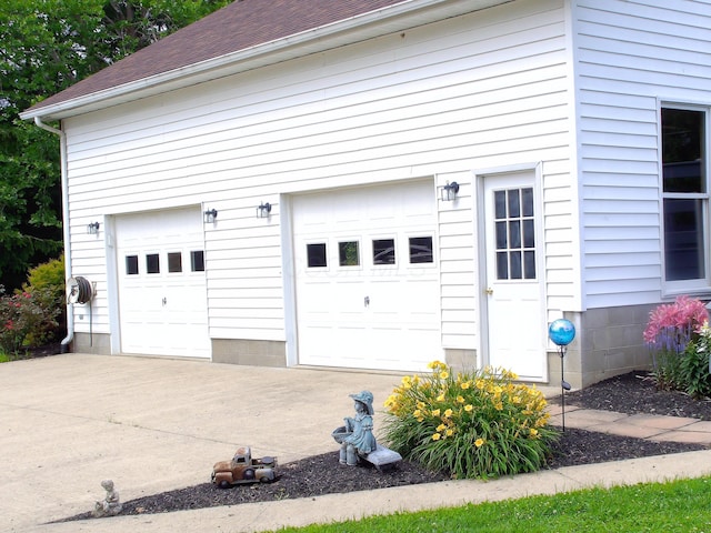 1110 Burr Oak Blvd, Nelsonville, OH 45764 - garage featuring concrete driveway