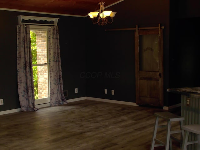 1110 Burr Oak Blvd, Nelsonville, OH 45764 - unfurnished dining area featuring ornamental molding, a chandelier, and wood finished floors