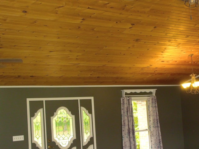 1110 Burr Oak Blvd, Nelsonville, OH 45764 - detailed view of ornamental molding, a chandelier, and wooden ceiling