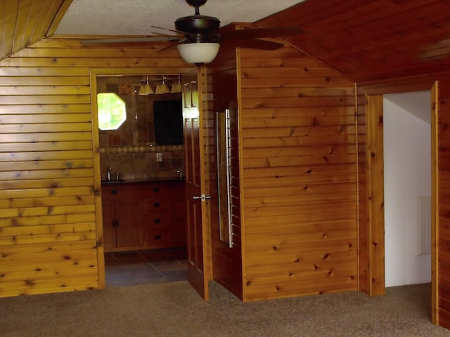 1110 Burr Oak Blvd, Nelsonville, OH 45764 - additional living space with carpet, a ceiling fan, wooden walls, lofted ceiling, and wooden ceiling