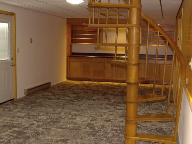 1110 Burr Oak Blvd, Nelsonville, OH 45764 - bar featuring a baseboard heating unit, stairway, and carpet floors
