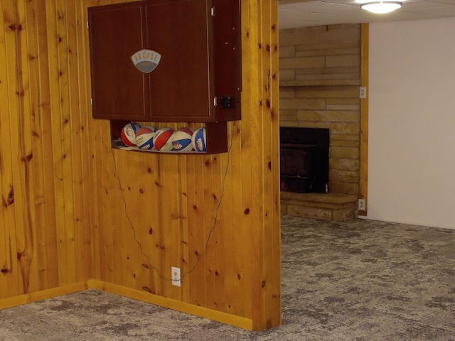 1110 Burr Oak Blvd, Nelsonville, OH 45764 - detailed view of carpet floors, wooden walls, and a fireplace