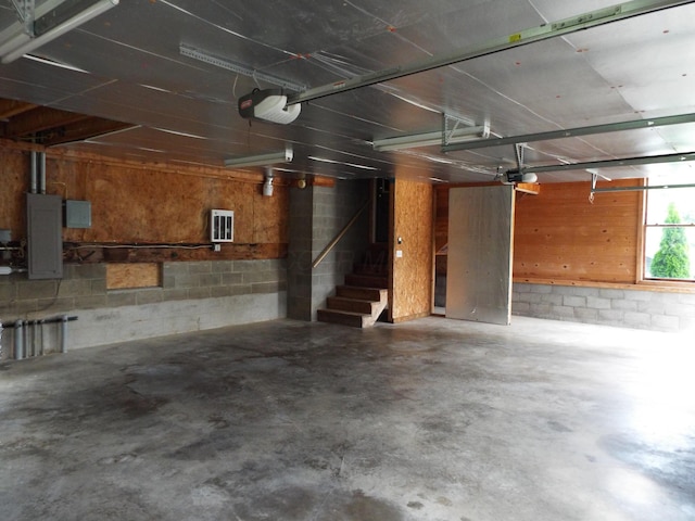 1110 Burr Oak Blvd, Nelsonville, OH 45764 - garage with electric panel and a garage door opener