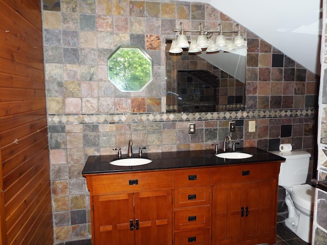 1110 Burr Oak Blvd, Nelsonville, OH 45764 - bathroom featuring double vanity and decorative backsplash