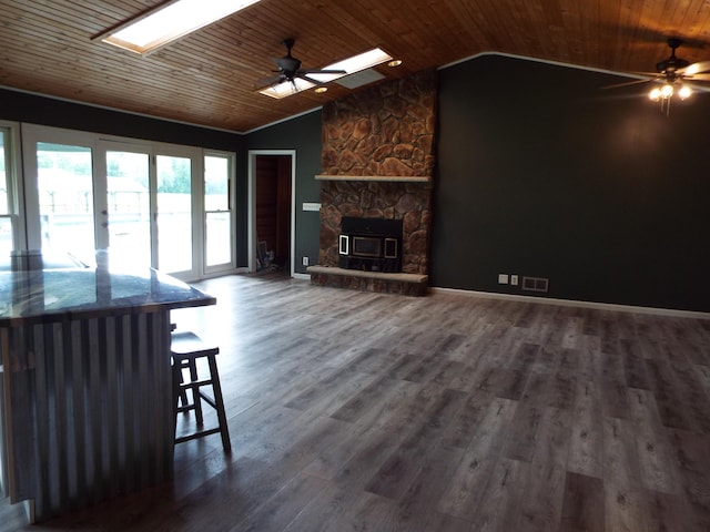 1110 Burr Oak Blvd, Nelsonville, OH 45764 - living room with a ceiling fan, a skylight, lofted ceiling, wood ceiling, and dark wood finished floors