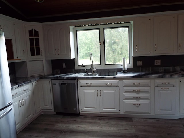 1110 Burr Oak Blvd, Nelsonville, OH 45764 - kitchen featuring appliances with stainless steel finishes, white cabinets, and wood finished floors