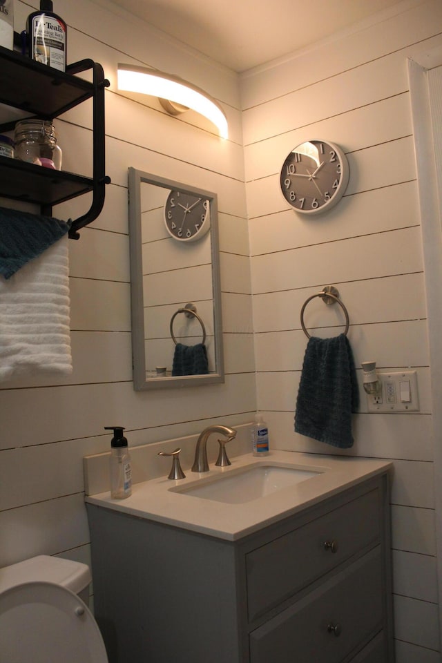 1261 Elm Park Pl, Galloway, OH 43119 - bathroom with vanity and wood walls