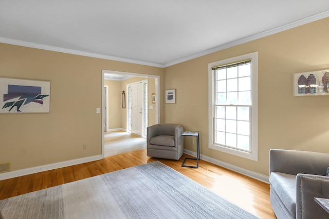 7661 Norhill Rd, Columbus, OH 43235 - living area with light wood finished floors and crown molding