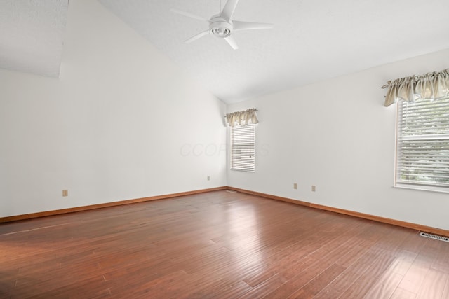 1296 Blacksmith Dr, Westerville, OH 43081 - spare room featuring lofted ceiling, a ceiling fan, and wood finished floors