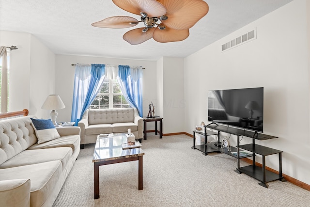1296 Blacksmith Dr, Westerville, OH 43081 - carpeted living room featuring ceiling fan and baseboards