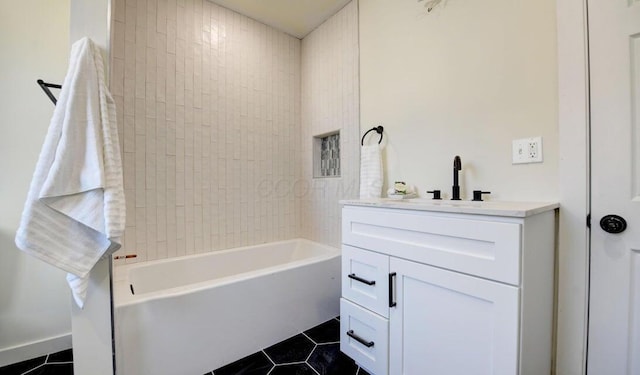 798 E Mithoff St, Columbus, OH 43206 - full bathroom featuring tile patterned floors, vanity, and shower / bathtub combination