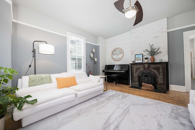 1066 City Park Ave, Columbus, OH 43206 - living room featuring a ceiling fan and wood finished floors