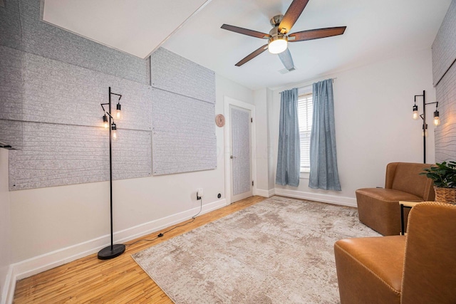 1066 City Park Ave, Columbus, OH 43206 - sitting room with a ceiling fan and wood finished floors