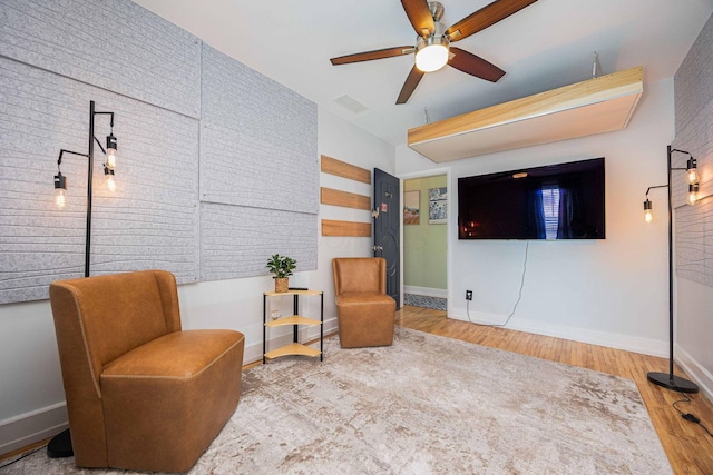 1066 City Park Ave, Columbus, OH 43206 - sitting room featuring wood finished floors and a ceiling fan