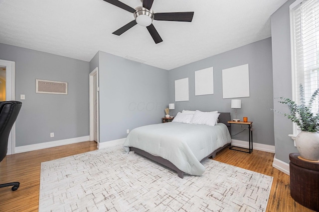 1066 City Park Ave, Columbus, OH 43206 - bedroom featuring wood finished floors and ceiling fan