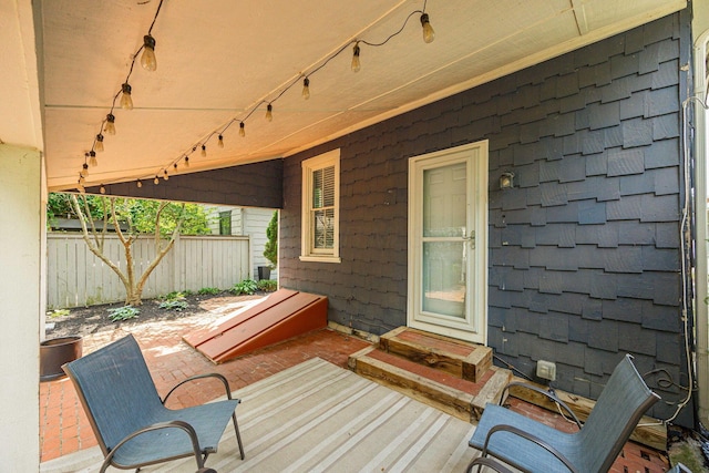 1066 City Park Ave, Columbus, OH 43206 - wooden deck with entry steps and a patio area