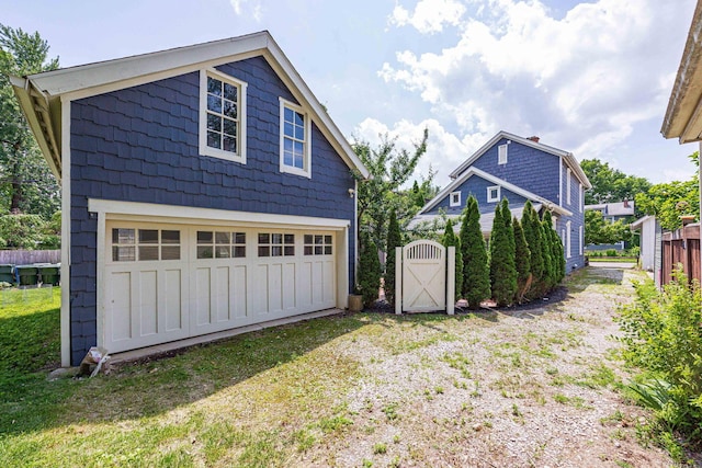 1066 City Park Ave, Columbus, OH 43206 - garage featuring a garage and a gate