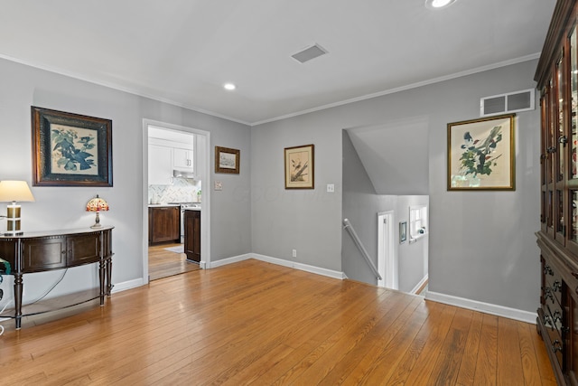 170 Joy Ln, Granville, OH 43023 - living room featuring light wood-style floors, recessed lighting, and ornamental molding