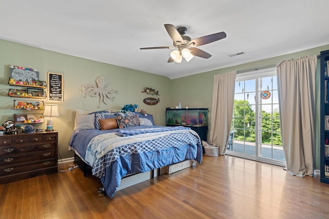 170 Joy Ln, Granville, OH 43023 - bedroom featuring access to exterior, wood finished floors, and a ceiling fan