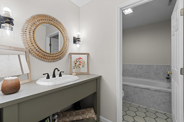 170 Joy Ln, Granville, OH 43023 - bathroom with a bath, vanity, and tile patterned flooring