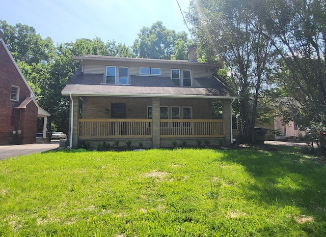 984 N Nelson Rd, Columbus, OH 43219 - back of property featuring covered porch and a lawn