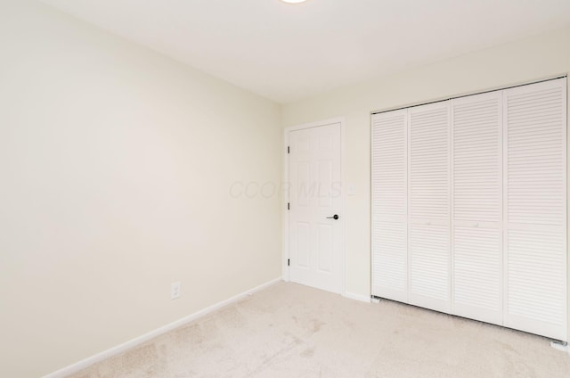 5309 Sundale Pl S, Columbus, OH 43232 - unfurnished bedroom featuring light colored carpet and a closet