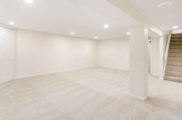 5309 Sundale Pl S, Columbus, OH 43232 - finished basement with light carpet, recessed lighting, and stairway