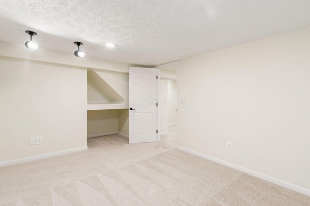 5309 Sundale Pl S, Columbus, OH 43232 - spare room featuring light colored carpet and a textured ceiling