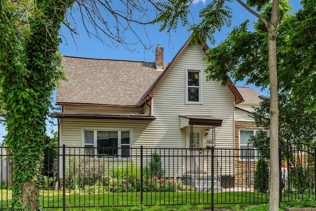 2350 Indiana Ave, Columbus, OH 43202 - back of property with a shingled roof and a chimney