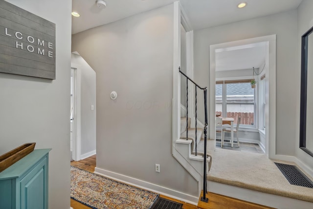 2350 Indiana Ave, Columbus, OH 43202 - hall with stairway, recessed lighting, and wood finished floors