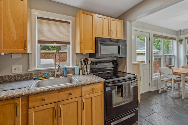 2350 Indiana Ave, Columbus, OH 43202 - kitchen with black appliances and stone tile flooring