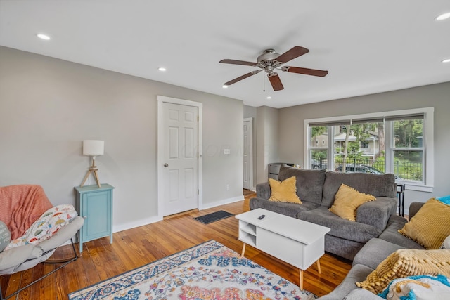 2350 Indiana Ave, Columbus, OH 43202 - living room featuring wood finished floors, a ceiling fan, and recessed lighting