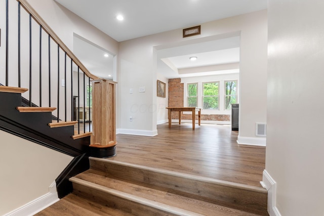 992 N Nelson Rd, Columbus, OH 43219 - staircase featuring wood finished floors and recessed lighting
