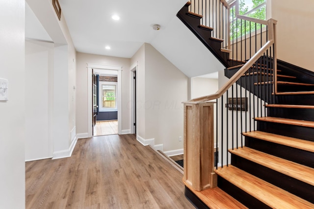 992 N Nelson Rd, Columbus, OH 43219 - staircase with wood finished floors and recessed lighting