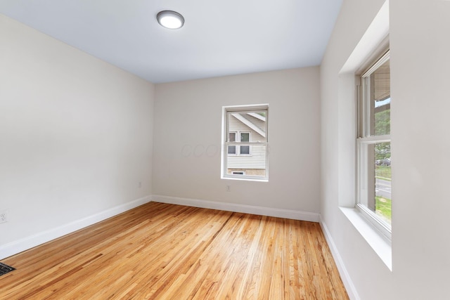 992 N Nelson Rd, Columbus, OH 43219 - spare room with healthy amount of natural light and wood finished floors