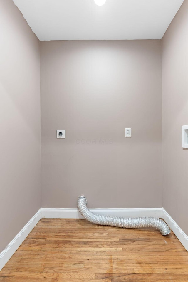 992 N Nelson Rd, Columbus, OH 43219 - washroom with electric dryer hookup and light wood-style floors