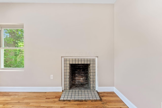 992 N Nelson Rd, Columbus, OH 43219 - detailed view of wood finished floors and a tiled fireplace