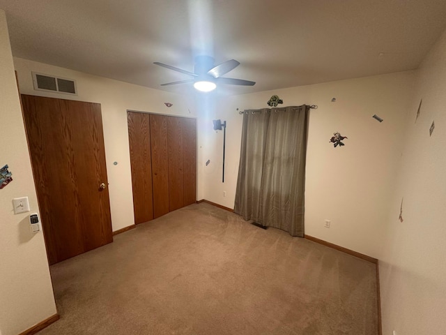 477 Greenlawn Dr, Howard, OH 43028 - unfurnished bedroom featuring light colored carpet and a ceiling fan