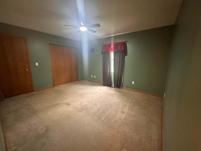 477 Greenlawn Dr, Howard, OH 43028 - unfurnished bedroom featuring carpet flooring, a closet, and ceiling fan