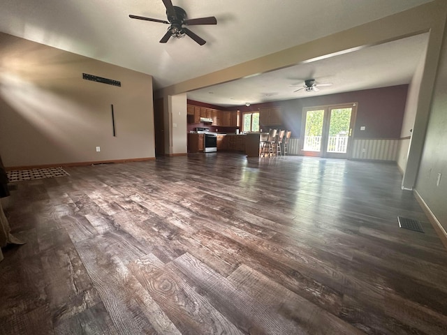 477 Greenlawn Dr, Howard, OH 43028 - unfurnished living room featuring a ceiling fan and dark wood-type flooring