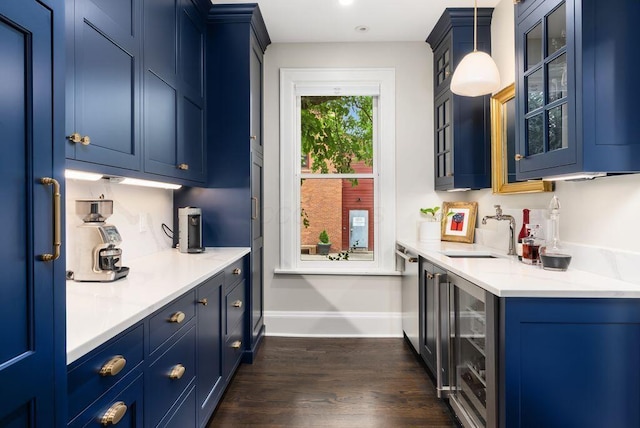 249 E Whittier St, Columbus, OH 43206 - kitchen featuring blue cabinetry, beverage cooler, glass insert cabinets, dark wood-style floors, and light countertops